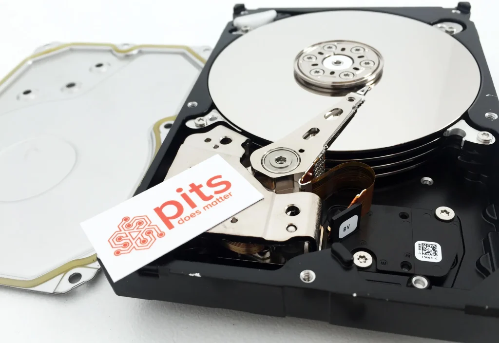 Interior view of an HDD featuring PITS Global logo sticker